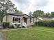 Single story house with black awning and large front window at 5348 Crittenden Ave, Indianapolis, IN 46220