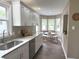 Modern kitchen features stainless steel appliances, granite countertops, and a light and bright breakfast nook at 5348 Crittenden Ave, Indianapolis, IN 46220