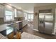 Modern kitchen features stainless steel appliances, granite countertops, and a light and bright breakfast nook at 5348 Crittenden Ave, Indianapolis, IN 46220
