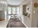 Modern kitchen features stainless steel appliances, granite countertops, and a light and bright breakfast nook at 5348 Crittenden Ave, Indianapolis, IN 46220