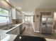 Modern kitchen features stainless steel appliances, granite countertops, and a light and bright breakfast nook at 5348 Crittenden Ave, Indianapolis, IN 46220