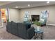 Basement living room with couch, two chairs and side tables featuring modern decor at 5348 Crittenden Ave, Indianapolis, IN 46220