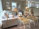 Cozy living room with modern decor, wood floors, and a neutral color palette at 5348 Crittenden Ave, Indianapolis, IN 46220