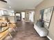 Open-concept living area with hardwood floors and modern decor at 5348 Crittenden Ave, Indianapolis, IN 46220