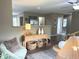 Open-concept living space with a view of the kitchen and a comfortable lounge area at 5348 Crittenden Ave, Indianapolis, IN 46220