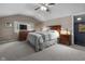 This comfortable bedroom features neutral colors and a ceiling fan for a relaxing atmosphere at 5543 N Pennsylvania N St, Indianapolis, IN 46220
