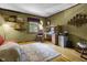 This office features hardwood floors, a desk, and shelves at 5543 N Pennsylvania N St, Indianapolis, IN 46220