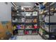 Organized storage shelves hold bins and various items, maximizing space in this functional area at 5543 N Pennsylvania N St, Indianapolis, IN 46220