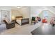 Spacious bedroom with neutral colors, decorated with colorful polka dots and a gray carpet at 5572 Harness Dr, Greenwood, IN 46143