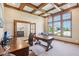 Bright home office with coffered ceiling, large windows, and custom trim work at 5572 Harness Dr, Greenwood, IN 46143
