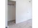 Bright bedroom with carpet flooring, a closet, a window, and a neutral color scheme at 5602 Northport Dr, Indianapolis, IN 46221