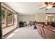 Bright living room featuring large windows, plush seating, and natural light at 564 Penright Ct, Indianapolis, IN 46217