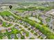 Aerial view of a community with ponds, green spaces, and well-maintained homes at 5737 Arlington Dr, Plainfield, IN 46168