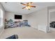 Spacious bonus room providing versatile living space and featuring a ceiling fan and ample storage at 5737 Arlington Dr, Plainfield, IN 46168