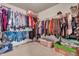 Spacious walk-in closet featuring ample shelving and hanging space for organized storage at 5737 Arlington Dr, Plainfield, IN 46168