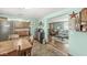 Dining area showcasing seamless transition to kitchen and inviting living space at 5889 W Homestead Dr, Frankton, IN 46044