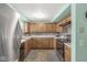 Well-equipped kitchen featuring modern stainless steel appliances and ample cabinet space at 5889 W Homestead Dr, Frankton, IN 46044