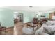 Open living room layout connecting to dining area with table and seating at 5889 W Homestead Dr, Frankton, IN 46044