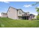 Expansive backyard featuring a spacious deck, mature trees, and well-manicured lawn at 589 Viking Warrior Blvd, Westfield, IN 46074