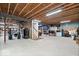 Spacious unfinished basement with exposed ceiling, ample storage, and concrete flooring at 589 Viking Warrior Blvd, Westfield, IN 46074