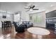 Cozy living room featuring hardwood floors, a fireplace, and comfortable seating area at 589 Viking Warrior Blvd, Westfield, IN 46074