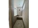 Walk-in shower equipped with a built-in bench and a rain shower head, offering a luxurious experience at 589 Viking Warrior Blvd, Westfield, IN 46074