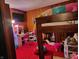 Bright bedroom featuring a bunk bed, desk, and carpet at 621 E 31St St, Anderson, IN 46016