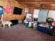 Wood paneled bedroom with clutter at 621 E 31St St, Anderson, IN 46016