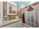 Bathroom with a granite countertop, a white sink, white cabinets, and a shower with a curtain at 6627 Cobden Ct, Indianapolis, IN 46254