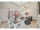 Inviting living room featuring a fireplace, neutral decor, tile flooring, and an open floor plan concept at 6627 Cobden Ct, Indianapolis, IN 46254