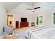 Spacious bedroom featuring large windows, hardwood floors, and ample closet space at 6630 Travis Rd, Greenwood, IN 46143