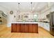 Bright kitchen with a center island, stainless steel appliances, and sleek countertops at 6630 Travis Rd, Greenwood, IN 46143