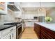 Spacious kitchen featuring an island, stainless steel appliances, and ample counter space at 6630 Travis Rd, Greenwood, IN 46143
