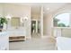 Luxurious bathroom featuring a walk-in shower, double vanity, and modern fixtures at 6630 Travis Rd, Greenwood, IN 46143