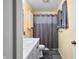Bathroom featuring a modern vanity, neutral walls, and shower at 6737 Raritan Dr, Indianapolis, IN 46221