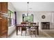 Inviting dining room featuring a wooden table, chairs, and sliding glass doors at 6737 Raritan Dr, Indianapolis, IN 46221