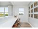 Built in office nook featuring a modern desk and bright windows with a neighborhood view at 6761 Seabiscuit Rd, Whitestown, IN 46075