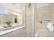 Modern bathroom featuring a glass-enclosed shower with tiled walls, and a sleek vanity, blending style with functionality at 6849 Seabiscuit Rd, Whitestown, IN 46075