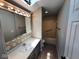 Functional bathroom featuring a vanity with lots of counter space and a bathtub at 70 Lookout Ridge Dr, Columbus, IN 47201