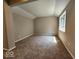 Comfortable bedroom featuring neutral paint, large windows, and plush carpeting at 70 Lookout Ridge Dr, Columbus, IN 47201