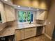 Modern kitchen featuring white cabinets, granite countertops, and stainless steel appliances at 70 Lookout Ridge Dr, Columbus, IN 47201