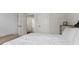 Bedroom with a view of the bathroom through an open door frame at 7051 E Bean Blossom Dr, Camby, IN 46113