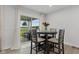 Inviting dining area with sliding glass doors opening to a patio and backyard at 7051 E Bean Blossom Dr, Camby, IN 46113