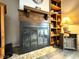 Close-up of a fireplace with wooden mantel and built-in shelving at 7445 Melanie Ln, Indianapolis, IN 46217