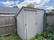 Close up of an outdoor shed surrounded by greenery at 7445 Melanie Ln, Indianapolis, IN 46217