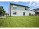 Expansive backyard featuring lush green grass, providing a private and serene outdoor space at 7549 Stockard St, Indianapolis, IN 46239