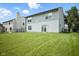 Expansive backyard with lush lawn and privacy fencing, perfect for outdoor activities at 7549 Stockard St, Indianapolis, IN 46239