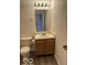 Bathroom features a single sink vanity and mirror at 7549 Stockard St, Indianapolis, IN 46239
