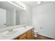 Bathroom featuring a double sink vanity with a shower in the background at 7549 Stockard St, Indianapolis, IN 46239