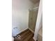 Bathroom featuring a shower with glass door and vinyl floors at 7549 Stockard St, Indianapolis, IN 46239
